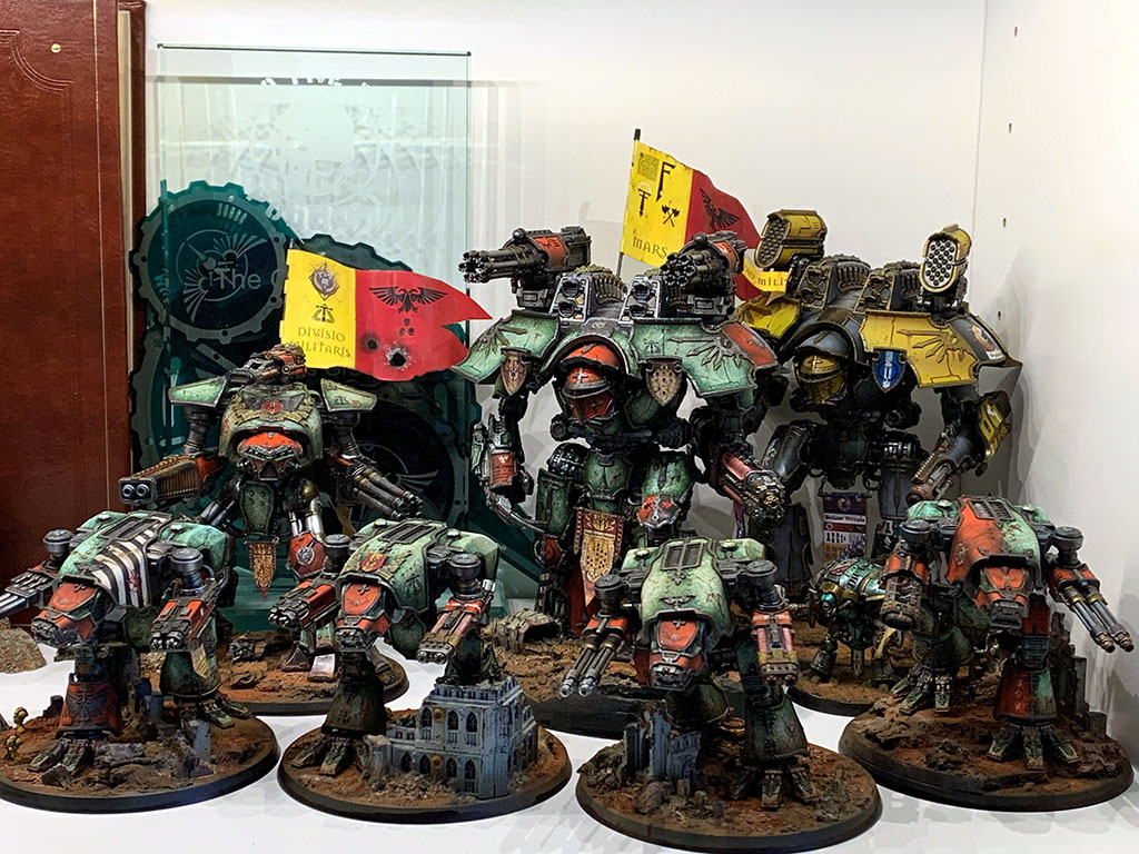 Display cabinet shelf with collection of painted Titan miniatures